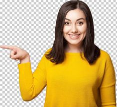 a woman pointing to the side with her finger in front of her face and wearing a yellow sweater