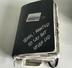 a black book with writing on it that says things i wanted 10 say but never did