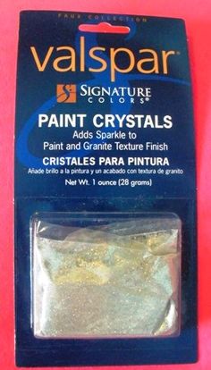 a package of paint crystals on a pink background