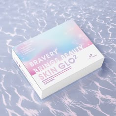 a box that is sitting on the ground with water around it and text reading braavery, brinings beauty skin glo