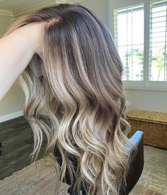 Our colorist line will be full of one-of-a-kind colors, hand-dyed by one of our top US colorists. They are perfection! Color Description: Level 6 root/base brunette with blended blonde balayage throughout. Brighter around the hairline and more dimensional through crown and back.  • Cap Construction: Lace Front Cap • Cap size: Medium 22”-22.5” • Length: 22” • 130% density • Slightly bleached knots *Please be aware that our colorist collection is not eligible for any discounts*    Disclaimer ** Our colorist-created wigs, skillfully designed by our talented colorists, are exquisite works of art. Each piece is thoughtfully processed to achieve the unique, custom look you desire. However, it's important to note that due to the bleaching process involved, there may be occasional drawbacks - The Blended Blonde Balayage, Cool Blonde Balayage, Blended Blonde, Brown To Blonde Ombre, Rave Hair, Dark Roots Blonde Hair, Brunette Balayage, Balayage Brunette, Colored Wigs