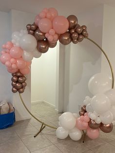 balloons are arranged in the shape of a wreath