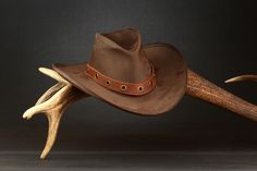 This is a cowboy leather hat, that is made in my workshop and is completely handmade. Main material is dark brown 3-4 oz (1.5mm) thick leather that is sewed together with brown waxed thread. All sizes are available, just measure your head circumference little bit above your ears, and let me know it. Cowboy Hat Cheap Bruned Brown, Adjustable Hand-tooled Brown Hat, Cowboy Hat Brown, Brown Brimmed Western Hat, Dark Brown Felt Cowboy Hat, Rodeo Hat, Brown Cowboy Hat, Leather Hat, Hat Handmade