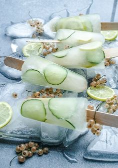 cucumber and lime popsicles on ice with garnish