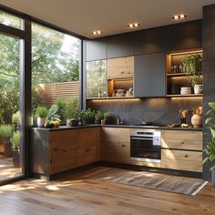 a kitchen with wooden floors and lots of plants on the counter top, along with sliding glass doors