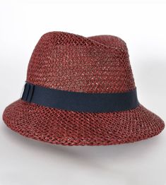 "\"Serge\", is a stylish companion that fits perfectly into every look. Light and flexible, made of \"twisted paper\", it offers maximum comfort. \"Serge\" is available in \"bordeaux\". Available in sizes 55 cm - 60 cm. Colour \"bordeaux\" Hat made of twisted paper 66% cotton and 34% polyamide on the inside Handmade Individualization options Other colours or sizes on request. All hats are handmade. For the production of a perfect hat it takes some time. All hats are ready 7-12 days after payment Elegant Brown Boater Hat For Beach, Fitted Woven Sun Hat With Short Brim, Woven Sun Hat With Short Brim, Elegant Adjustable Woven Hat Bands, Casual Straw Sun Hat For Garden Party, Summer Party Fedora With Curved Brim, Summer Party Fedora With Short Brim, Elegant Toquilla Straw Fedora For Vacation, Toquilla Straw Fedora Panama Hat For Garden Party