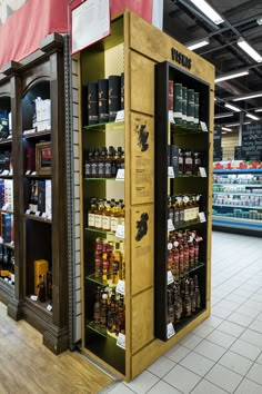 a store with shelves filled with lots of different types of liquor and condiments