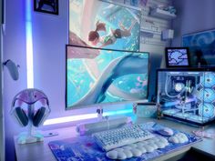 a computer desk with two monitors, keyboard and mouse in front of the monitor screen