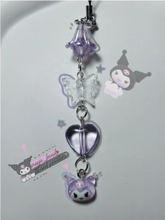 a key chain with charms attached to it