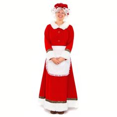 a woman dressed as santa clause standing with her hands in her pockets