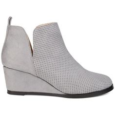 Journee Collection Womens Mylee Bootie Trendy and Chic are the Mylee bootie by Journee Collection. This stylish bootie features a soft faux suede material with a perforated detail on the top. The deep V cut-outs make for easy pull-on entry while the slight wedge adds attractive height. Heel Height: approx. 2 1/2" Heel Type: Wedge  Platform Height: approx. 1/2" Shaft Height: approx. 3 1/2" Top Circumference: approx. 11" Shoe Width: Medium Closure Type: Pull-on Toe Style: Round Lining: Fabric Uppe Suede Material, Journee Collection, V Cuts, Lining Fabric, Platform Wedges, Heel Type, Deep V, Cut Outs, Faux Suede