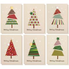 four christmas cards with different trees on them