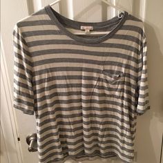 Nwot Gap Grey-And-White Striped T-Shirt. Size Sm. Soft + Stretchy With A Slightly Drapey Fit. 100% Viscose. A Little Wrinkled, But Nothing A Little Heat Can't Take Care Of :) Love The Shirt, But Need To Downsize! Gap T-shirt For Everyday Spring Wear, White Relaxed Fit T-shirt By Gap, Gap Graphic Tee For Spring, Gap Striped Cotton Tops, Gap Graphic Tee Tops For Summer, Gap Graphic Tee For Summer, Striped Cotton Gap Tops, White Cotton Gap T-shirt, Casual Gap T-shirt For Spring