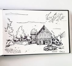 an open book with a drawing of a barn and car in the front, on a white background