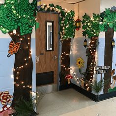 an indoor classroom decorated with trees and lights