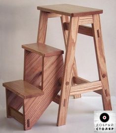 a wooden stool and step set made out of wood