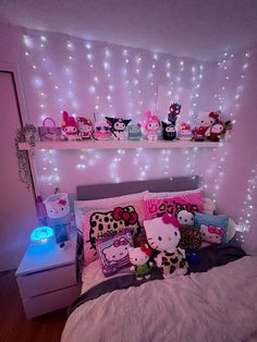 a bedroom with hello kitty decorations and lights