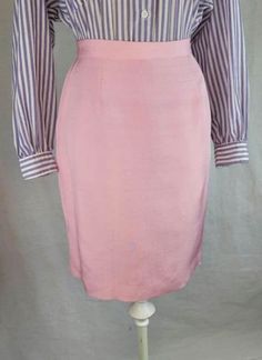 Vintage 90s silk pink pencil skirt in bubblegum pink. Zipper and button back closure. Fully lined. This  piece is in excellect vintage condition without notable flaws or stains. No designer label present. Labeled a size 8. Best fits a modern small.  Waist 27" Hips 38" Top to bottom 21.5" For more specific photos or measurements please message me, happy to provide. Pink Bubblegum, Pink Pencil, Pink Pencil Skirt, Designer Label, Lined Skirt, Saint Paul, Bubblegum Pink, Small Waist, Bubble Gum