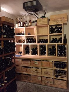 a wine cellar filled with lots of bottles