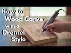 a person using a wood carving tool on a wooden block with the words how to wood carve with a dremel style