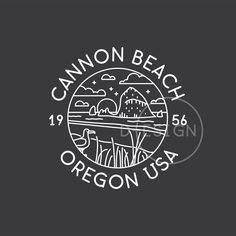 the cannon beach oregon usa logo on a black background with white lettering and an image of mountains