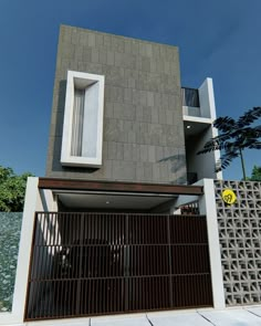 a modern house with an open gate in front of it