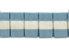 the blue and white striped rug is lined up against each other on a white background