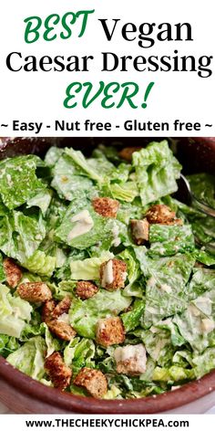 vegan caesar salad dressed in a salad bowl Vegan Ceasar Dressing, Vegan Cesar Salad, Vegan Ceasar Salad, The Best Caesar Salad, Best Caesar Salad, Vegan Caesar Salad Dressing, Vegan Caesar Dressing, Caesar Dressing Recipe, Vegan Caesar Salad