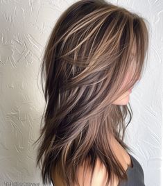 Distinct layers with alternating lengths Shag Hair Highlights, Hair Styles With Layers Medium, Long Layered Highlighted Hair, Medium Length Haircut For Thick Hair Round Faces Over 40, Long Hair With Layers 2024, Short Layers Haircuts For Medium Hair, Top Hairstyles For 2024, Layered Hair 2024, Short Layers Long Hair With Bangs