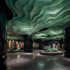 the interior of a clothing store with green and black colors