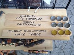 there are several different types of bottle caps on this sign, including one for hillbilly and the other for back scratchers