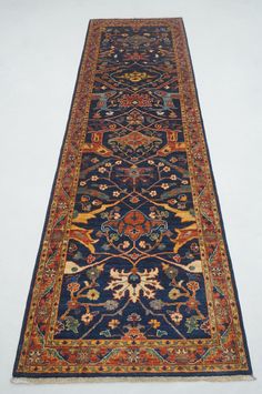 a blue rug with an intricate design on it