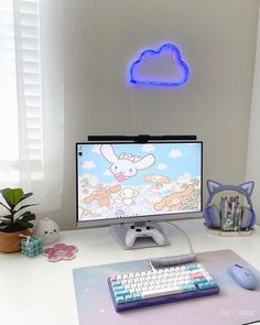 Violet and white gaming setup with Cinnamoroll wallpaper Cat Gaming Setup, Lilac Pc Setup, Cute Gaming Setup Purple, Sakura Gaming Setup, Kawaii Gaming Setup Purple