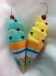 two ice cream cones are made to look like they're ready to eat them