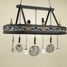 a chandelier with hanging pots and pans