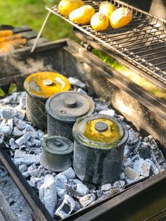 some food is cooking on an outdoor grill