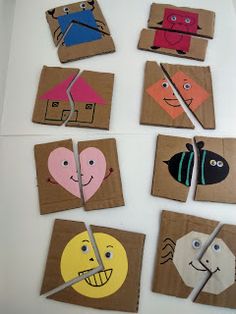 several pieces of cardboard with different faces on them