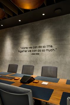 Dimensional letters are applied to a distressed conference room wall to display an inspiring quote by Helen Keller. Conference Room Wall Art, Startup Office Design Inspiration, Quote For Work Office, Office Startup Design, Tech Office Design Workspace Inspiration, Corporate Office Wall Art, Boardroom Aesthetic, Board Room Design Corporate, Creative Director Office