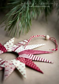 a red and white ornament sitting on top of a table