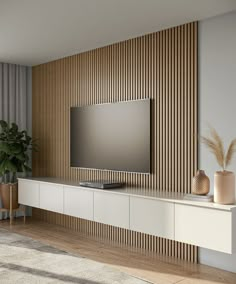 scandinavian apartment living room with flatscreen tv and vertical wood slat wall panelling Tv Kastenwanden, Tv Fal, Feature Wall Living Room, Tv Room Design, Accent Walls In Living Room, Tv Wall Unit, Tv Wall Design, Wall Designs, Tv Decor