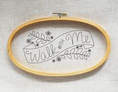 a cross stitch pattern with the words walk me on it in black and white embroidery