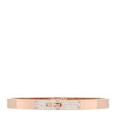 This is an authentic HERMES 18K Rose Gold Diamond PM Kelly Pave Bracelet SH. The bracelet is crafted of 18 karat rose gold and features the signature Kelly turn-lock clasp pave-set with 61 round brilliant cut diamonds, approximately .36 total carat weight. Hermes Bracelet, Pave Bracelet, Hermes Jewelry, Rose Gold Bracelet, Rose Gold Diamonds, Round Brilliant Cut Diamond, Brilliant Cut Diamond, 18k Rose Gold, Round Brilliant