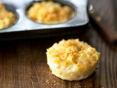 there are some muffins on the table ready to be baked in the oven