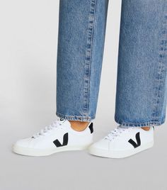 A brand that prides itself on sustainability and social responsibility, these sneakers from VEJA take their name from an NGO that aids organic cotton farms in Brazil, working with VEJA since 2004. A cult model with the contrasting V detail, the ESPLAR sneakers are crafted from smooth leather with wild rubber soles sourced from the Amazon and organic cotton lining. Veja Sneakers Outfit, Tenis Veja, Round Toe Sneakers, Sneakers Grey, Sneakers Outfit, Social Responsibility, The Amazon