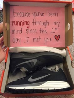 someone is holding up a box with a pair of shoes in it that says, because you've been running through my mind since the 1st day i met you