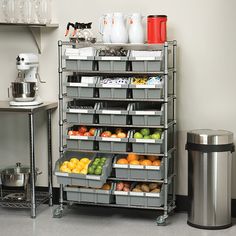 Neatly organize and sort your space with the Seville Classics Commercial 7-Shelf Bin Rack Storage System. This uniquely patented design features 16 polypropylene (PP) bins (12 large, 4 XL) that slide out easily and lock onto the ventilated industrial strength steel shelves. Includes 12 large bins (10.5-in W x 14-in D x 7-in H), 4 XL bins (16-in W x 14-in D x 7-in H), 4 bin dividers, 16 bin labels and 3-in grey wheels (two locking). This convenient storage system can organize a variety of things include tools, hardware, papers and documents, produce, office and school supplies, etc. This versatile mobile bin rack system is certified by the NSF to NSF/ANSI Standard 2 - Food Equipment, for commercial use and measures 36-in wide x 14-in deep x 56-in high. Ideal for use in garages, warehouse, m Commercial Kitchen Organization, Restaurant Kitchen Design, Bar Restaurant Design, Bin Rack, Organiser Cucina, Commercial Kitchen Design, Shelf Bins, Bakery Kitchen, Kitchen Storage Shelves