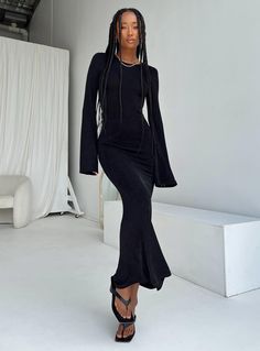 Long sleeve maxi dress Slim fitting 95% polyester 5% spandex Length of size US 4 / AU 8 shoulder to hem: 141cm / 55.5in Eyes is wearing a size US 2 / AU 6 Sheer material Tie fastening back of neck Flared sleeve Low back Good stretch Unlined Long Sleeve Maxi Dress Black, Shop Winter Dresses, Stylish Maxi Dress, All Black Dresses, Office Siren, Maxi Dress Black, Maxi Dress Online, Grad Dresses, Black Long Sleeve Dress