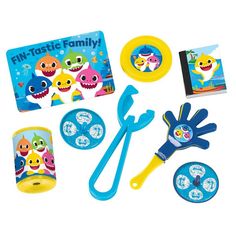 children's play set with toys including scissors, gloves and other items on white background