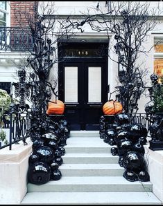 halloween decorations are lined up on the steps