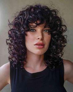 Shag Hairstyles On Curly Hair, Curly Bridal Hair With Bangs, Curly Hair 2023 Trends Women, Dark Hair With Highlights With Bangs, Face Framing Curly Hairstyles, Curly Perm With Bangs, Heavy Bangs Curly Hair, Curly Layered Haircuts Short, Layered Curly Hair With Fringe